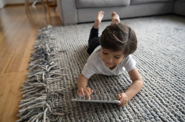 Girl lying on rug | Hopkins Floor Co